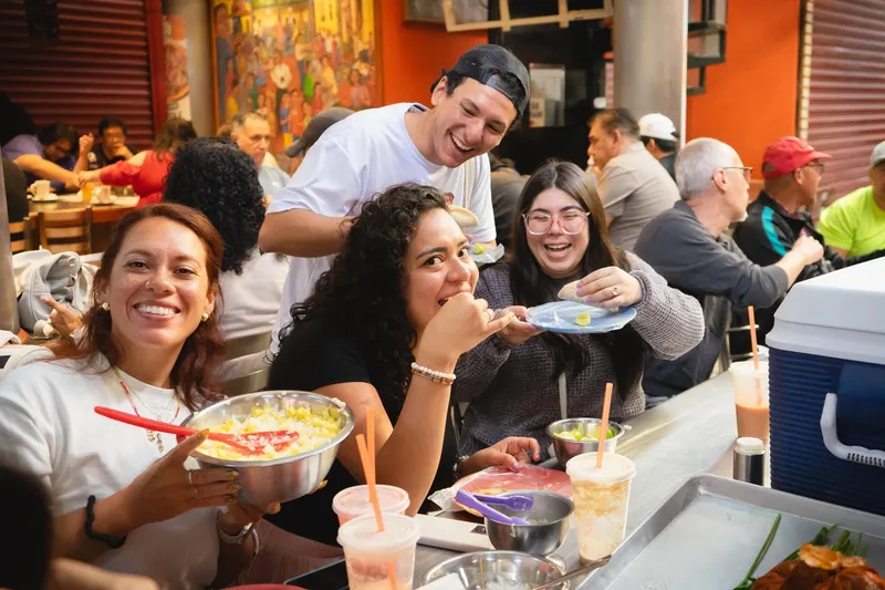 Stalls of fresh food and produce inside the historic Coyoacán Market on a Coyoacán food tour in Mexico City